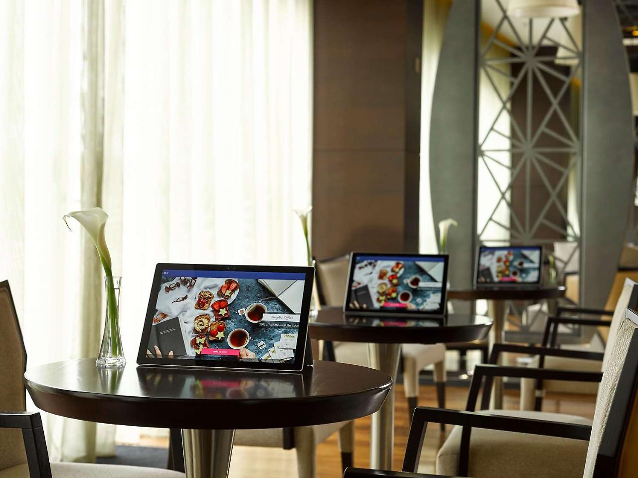 Radisson Blu Hotel & Convention Centre Kigali Dış mekan fotoğraf A tablet computer